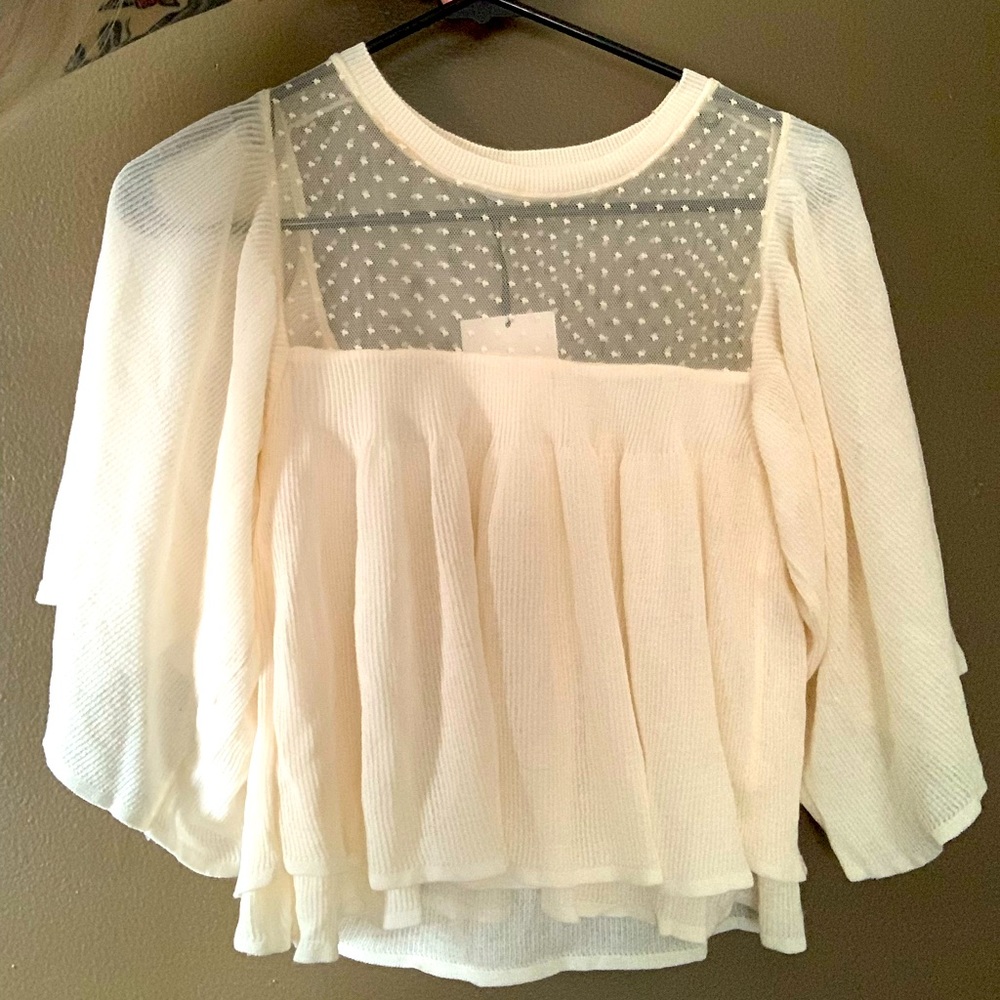 Cream colored top from Zara . Size M . Made in Turkey.